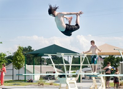 Diving into a pool